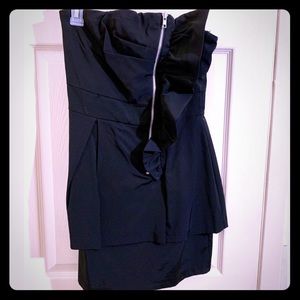 Women’s black peplum asymmetrical zip dress